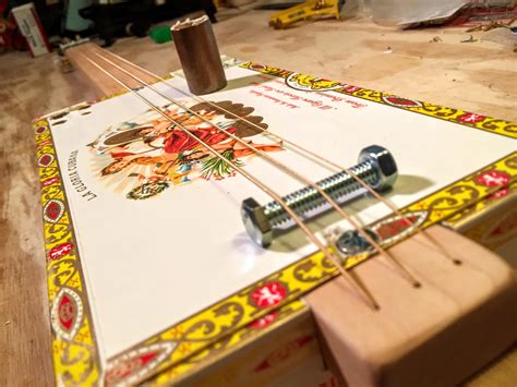 how to make a simple electric cigar box guitar|cigar box guitar for beginners.